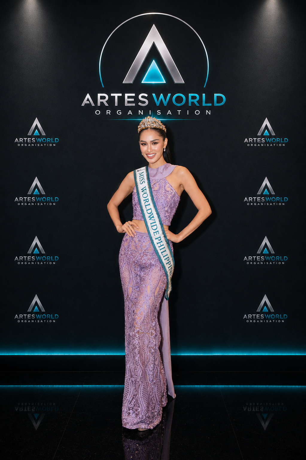 ChatGPT Image May 17 2026 01_02_50 PM Miss Worldwide Philippines in a purple gown and crown at ArtesWorld Organisation event